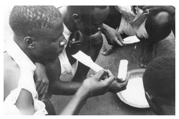 Zyoba eating manioc mush with bamboo number 44 1950